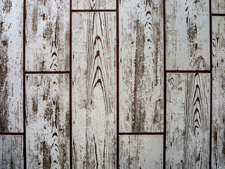 Abstract wood texture. Wooden boards are laid out vertically against the background. Copy space.