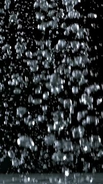 Dynamic closeup of cascading water in slow motion with dramatic splash effects