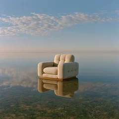 An elegant beige armchair with a wooden base sits on tranquil water, perfectly reflecting the clear sky and subtle clouds above