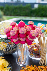 Outdoor catering buffet with a variety of food snacks and appetizers