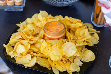 Outdoor catering buffet with a variety of food snacks and appetizers
