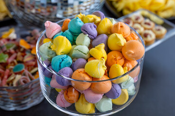 catering buffet with variety of food snacks and appetizers.