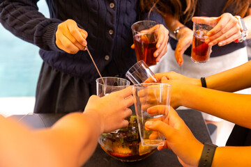 friends with drinks at the party