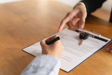 Business car rental company service, Close up hand of agent dealer giving, holding car key to...