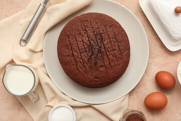 Composition with sponge cake layers and ingredients on color background