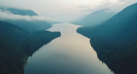 Mystical twilight over a serene lake surrounded by lush mountain forests