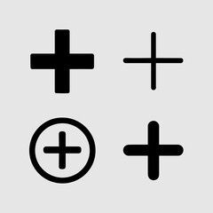 Plus Signs A collection of four distinct plus signs, offering a versatile visual element for a range of design needs, from medical symbols to mathematical concepts.