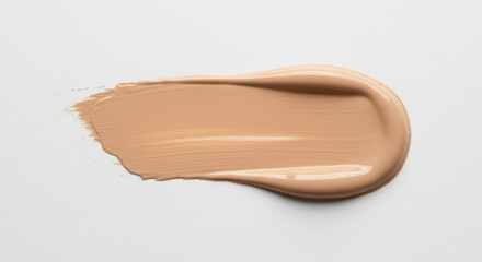 Beige foundation smear or liquid tone makeup stroke swatch.Swatch of cosmetic foundation on a white background. Beauty product for makeup application. Skincare and beauty concept.	
