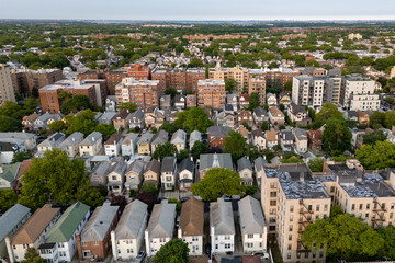 City buildings sprawl below, as seen from a high angle.