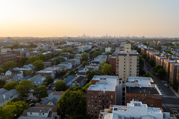 City buildings sprawl below, as seen from a high angle.