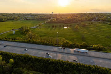 Cars driving on a busy highway.
