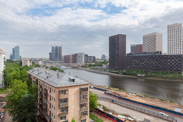 A new residential area of Moscow's capital Khoroshevo-Mnevniki and Filevsky Park with high-rise buildings and bridges over the Moskva River overlooking Moscow City and the old 5-story residential.