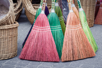 Vibrant Whisks of Tradition: The Colorful Broomsticks of Salzburg’s Market