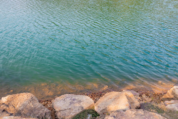 Serene Lakeside Water and Stones
