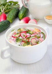 Summer yoghurt cold soup with radish, cucumber, and dill