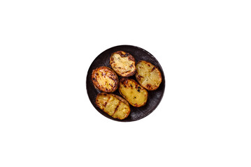 Food, potatoes cut in halves or slices grilled. Cooked baked potatoes