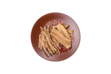 Dried salted fish, snacks or jerky, slices of white fish fillets