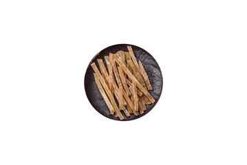 Food, snacks or jerky made from dried dehydrated salted fish with spices. Snacks fish