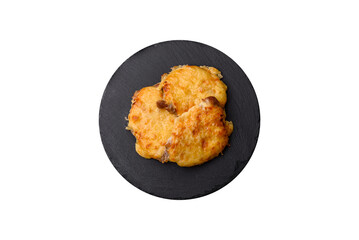 Steak, a pork or chicken chop covered with melted cheese. Grilled meat