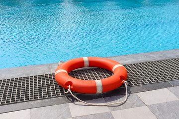 lifebuoy with Swimming pool. swimming pool safety ring near swimming pool. Safety Concept .