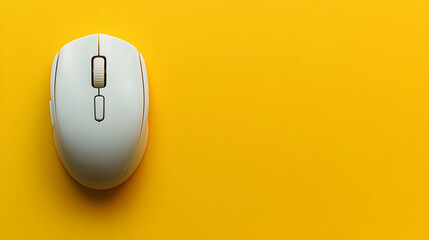 Minimalist flat lay of a sleek white computer mouse against vibrant yellow backdrop