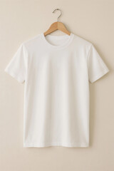 A simple, white t-shirt hangs neatly on a wooden hanger, perfect for showcasing design.