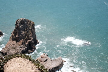 Big waves crashing on rocks