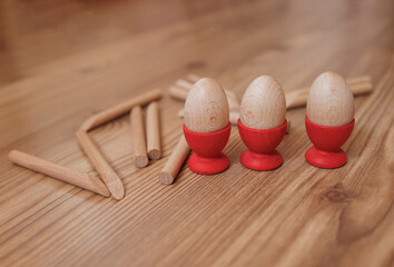 wooden toy blocks with a wooden figure