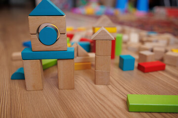 toy wooden blocks on wooden background