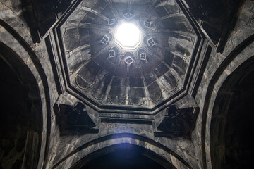 Ancient Armenian church dome with light from above