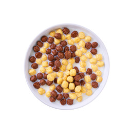 corn balls and chocolate corn balls with milk in a bowl isolated on a white background, top view.