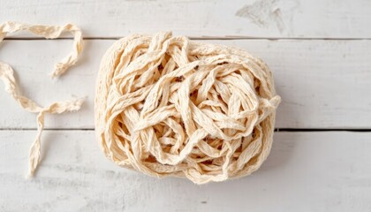 Natural loofah sponge on a rustic wooden surface