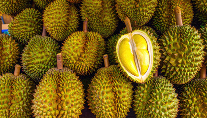 Fresh Durian Fruits Displayed at Market with One Open Half Showing