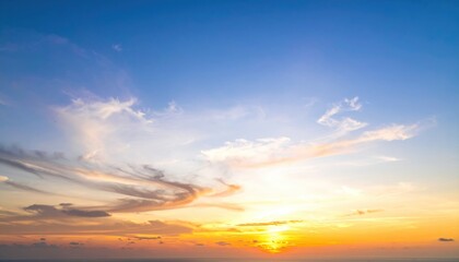 Fototapeta premium Serene Sunset Over Ocean with Colorful Sky and Soft Cloud Patterns