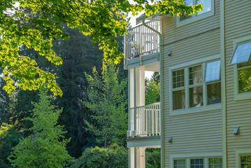 Top of modern apartment building with nice windows in Summer in Vancouver, Canada, North America. Day time on May 2025.