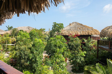 Hotel rooms at Kontiki Beach Resort with Thatched roof of palm leaves