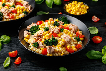 Tuna corn pasta salad with tomatoes and broccoli