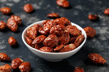 Caramelized almonds. Toasted almonds coated with caramel syrup.