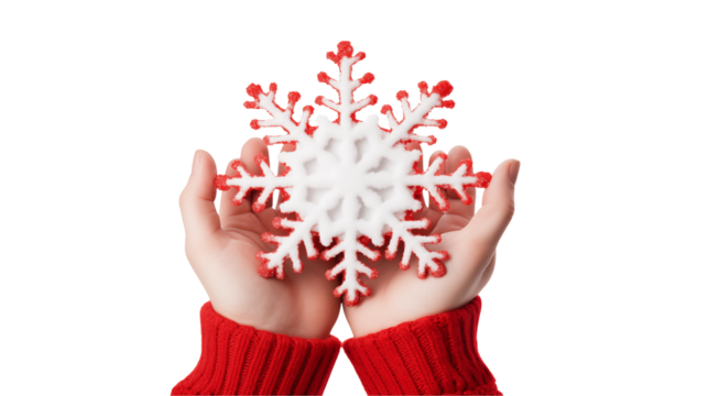 Red hands hold a festive white snowflake ornament against isolated on transparent background	