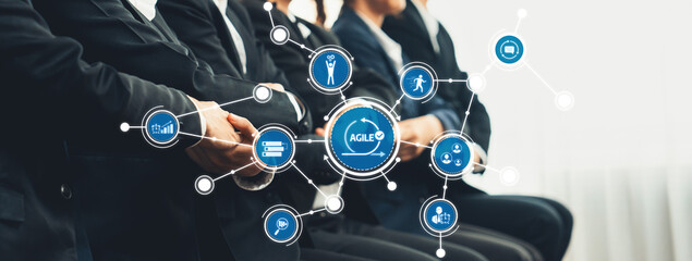 A formal business meeting showcasing a diverse team in suits engaged in discussions. Visuals of...