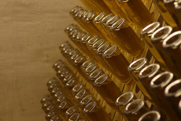 Production of carbonated apple cider. Glass bottles with cider in an inverted state with selective...