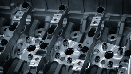 Close-up of a disassembled silver car engine auto service concept background.