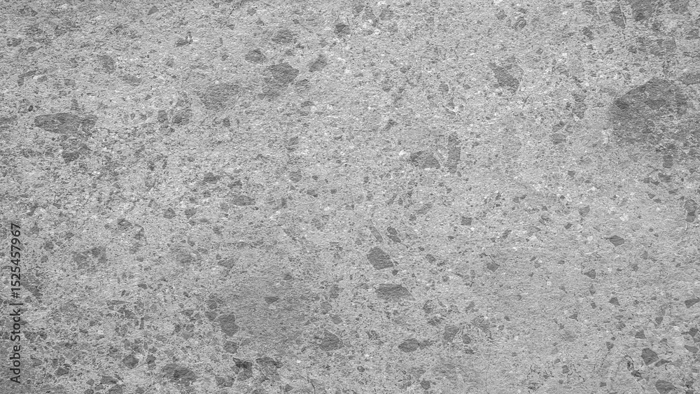 Aufkleber A grey and white background with a few small dots scattered throughout. The background is a solid grey color, while the dots are small and white. The overall effect is a simple and minimalistic look