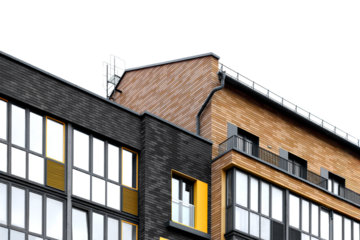 Building corner with yellow and black facade featuring wood texture and geometric balconies. Modern