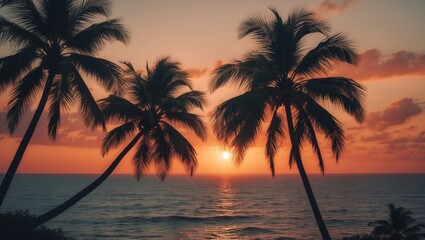 Fototapeta na wymiar Tropical beach sunset with silhouetted palm trees, warm colors, and calm ocean scenery.