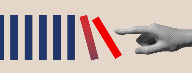 Hand breaking red domino block in blue pattern. Concept of disruption, innovation, rebellion,