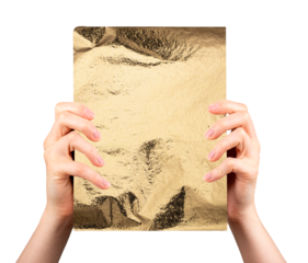 Female hands holding shiny crumpled gold foil sheet in front display. Elegant mockup with luxury