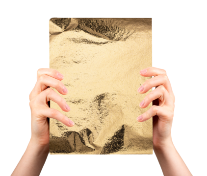Female hands holding shiny crumpled gold foil sheet in front display. Elegant mockup with luxury