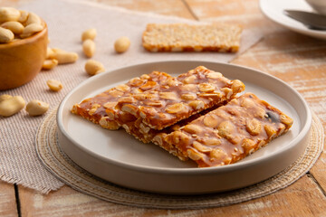 Chinese Peanut and Sesame Bar,Peanut brittle crisp candy in a plate.Thai snack.