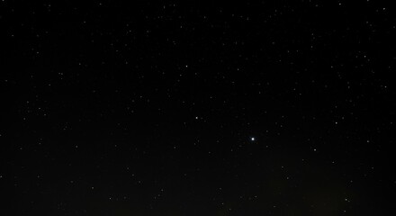 Obraz premium Dark Night Sky with Scattered Stars